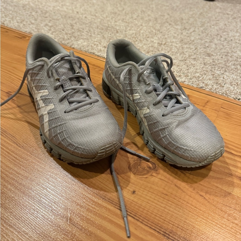 Women’s gray/silver ASICS running shoes